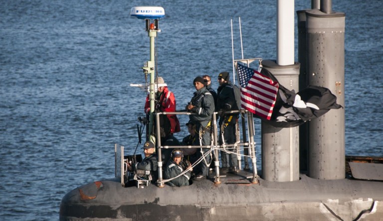 On Tuesday, a sharp eyed journalist, Ian Keddie, noted that the Seawolf-class attack submarine, USS Jimmy Carter, had returned to its Washington port while flying the Jolly Roger pirate flag. The Navy, whether by accident or by design, published the photo online. (U.S. Navy photo by Lt. Cmdr. Michael Smith/Released)