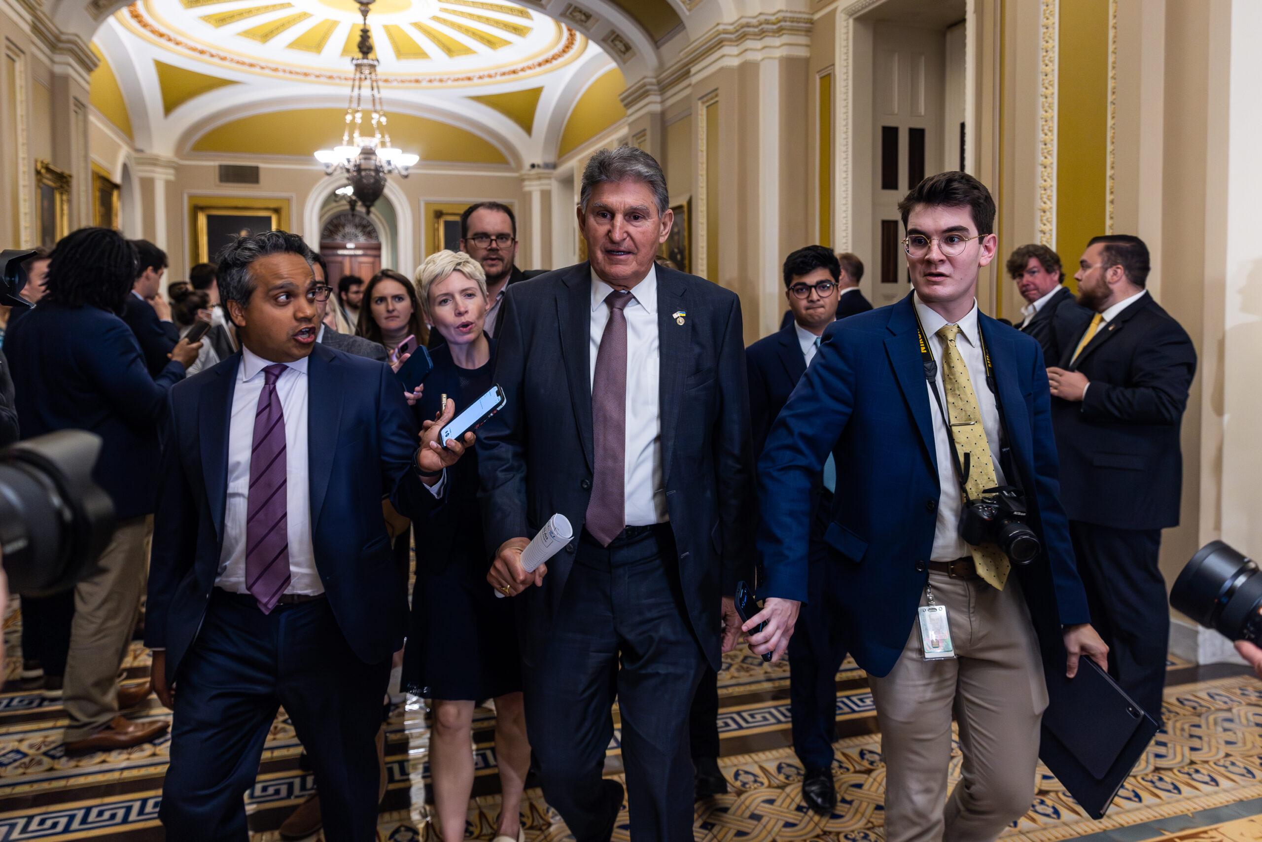 Sen. Joe Manchin, a Democrat from West Virginia, takes questions from the press following the weekly Democratic caucus luncheon on Capitol Hill, on Tuesday, May 2, 2023. Manchin has pushed back on President Joe Biden's agenda regarding the debt ceiling. Lawmakers plan to meet with Biden next week to hash out bipartisan talks on a solution to the crisis. 
