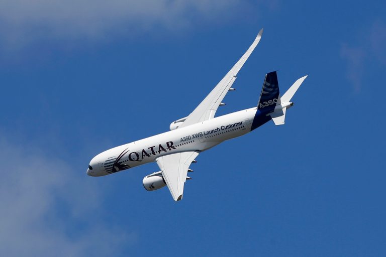 An Airbus A350 XWB flies on display during Farnborough International Air Show, Farnborough, England, Monday, July 14, 2014. (AP Photo/Sang Tan)