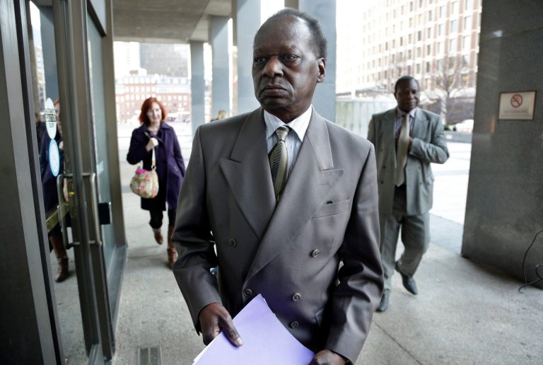 In this Dec. 3, 2013, photo Onyango Obama, President Barack Obama's Kenyan-born uncle, arrives at U.S. Immigration Court for a deportation hearing. The White House said Dec. 5, that President Barack Obama briefly lived with an uncle who faced deportation from the United States, correcting its previous statements that the president had never met Onyango Obama. The 69-year-old, Kenyan-born half-brother of Obama's estranged father was granted permission this week to stay in the U.S. after ignoring a deportation order two decades ago. (AP Photo/Steven Senne)