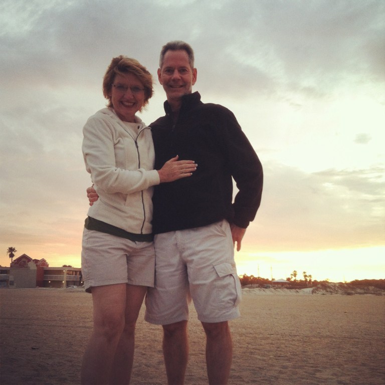 In this Dec. 2012 photo taken by their daughter Alyssa Krause and made available by her, Jerry Krause, right, and wife Gina pose together for a photo on the beach in St. Augustine, Florida. Ten days ago, on Sunday, April 7, 2013, Jerry Krause disappeared together with his plane just miles from a refueling stop at a West African island. Since then, searches with a plane and boats have found no trace of Krause, a 54-year-old missionary and pilot, or the twin-engine Beechcraft 1900C that he was flying from South Africa to Mali. Krause's family in Mali, where he has lived for 16 years, and in Waseca, Minnesota, believes he is alive and could have landed in hostile territory.(AP Photo/Alyssa Krause)