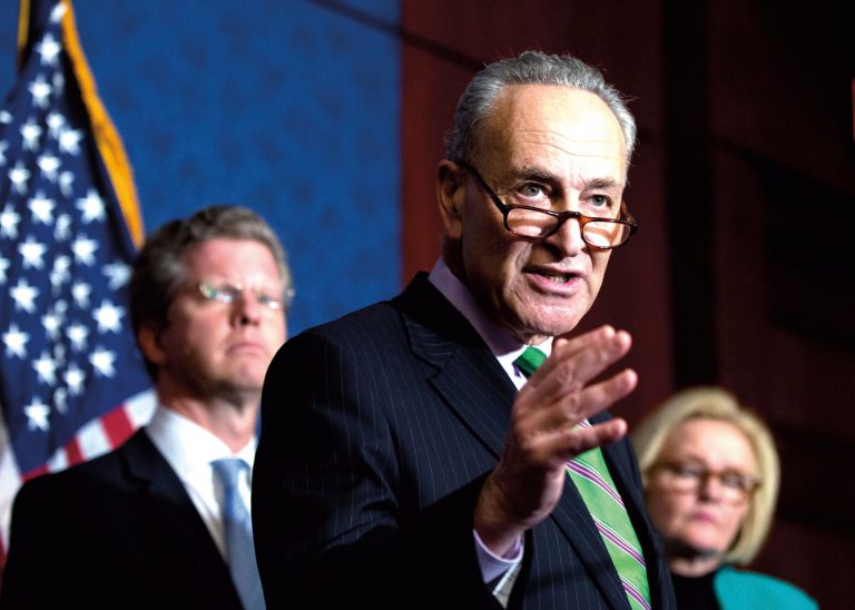 Sen. Chuck Schumer, D-N.Y., center, with Sen. Claire McCaskill, D-Mo., right, and Office of Management and Budget Director Shaun Donovan, left, speaks to reporters during a news conference on Capitol Hill in Washington, Thursday, March 12, 2015. (AP Photo/Manuel Balce Ceneta)