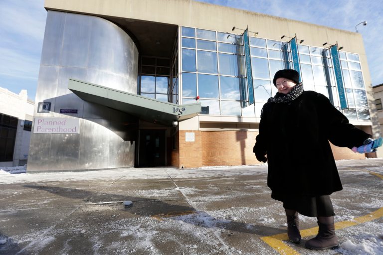 Anti-abortion protester Eleanor McCullen, of Boston, stands at the painted edge of a buffer zone outside a Planned Parenthood location in Boston. (AP/Steven Senne)