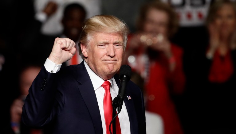 President-elect Donald Trump met Thursday with the mayors of Columbia, S.C., New Orleans, La., Oklahoma City, Okla., and other members of the U.S. Conference of Mayors. (AP Photo/Matt Rourke)