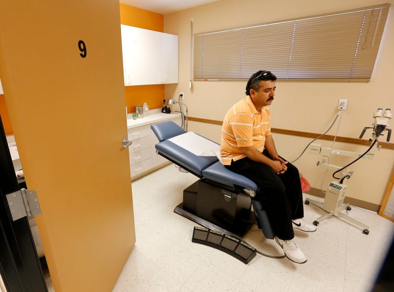 Gov. Brown signs bill asking federal government to grant waiver. (AP Photo/Matt York)