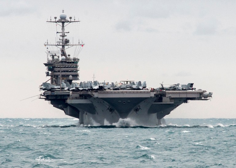 Analyst said extending a carrier's time at sea could raise costs by creating more wear and tear on the ship. (Mass Communication Specialist 2nd Class M. J. Lieberknecht/U.S. Navy via AP, File)