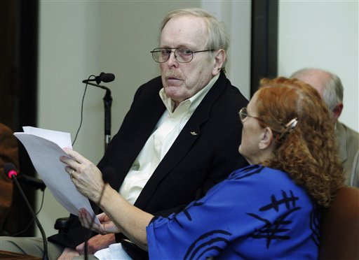 As his sister and advocate Susan Simmons, right, holds his prepared statement for him, Mike Simmons, left, a military veteran, tells an Oklahoma House interim study committee in October 2012 that he was physically abused at Oklahomaâs Norman Veterans Center and staff members tried to intimidate him. (AP Photo/Sue Ogrocki)
