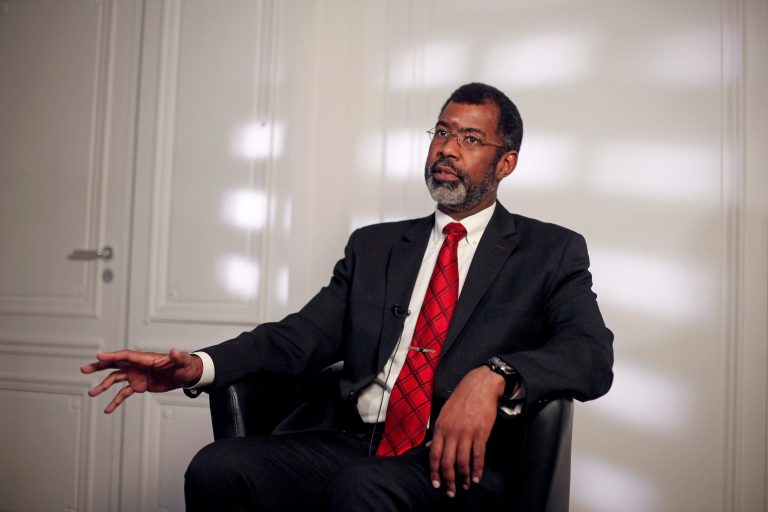 In this photo taken on Monday, April 14, 2014, incoming Nuclear Energy Agency chief William Magwood gestures during an interview with The Associated Press, in Paris. Tiny nuclear power plants that could be far cheaper to build than their behemoth counterparts could herald the future for an energy industry that has come under scrutiny since the Fukushima disaster. In the United States, Magwood hopes the modular reactors will replace outdated coal plants. (AP Photo/Thibault Camus)