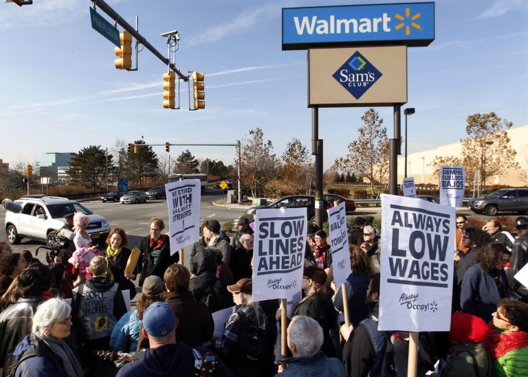 A large gathering protests against Wal-Mart on Black Friday, Nov 23, 2012, in Secaucus, N.J. (AP Photo/Mel Evans)