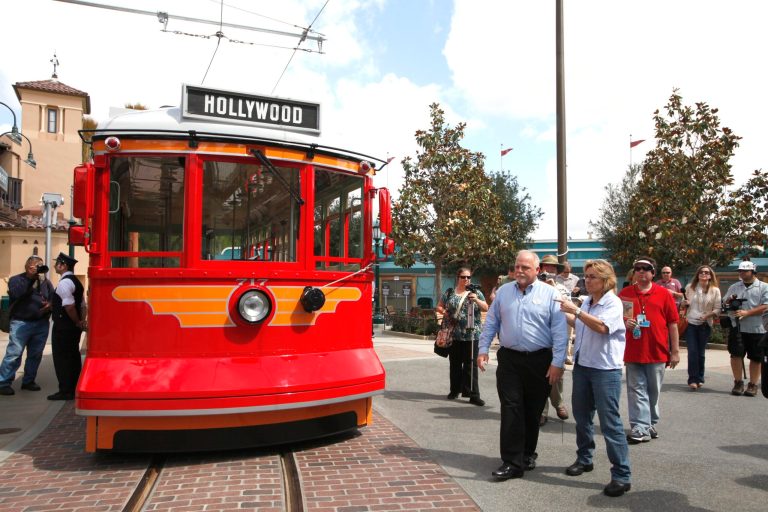   This June 5, 2012 photo shows Ray Spencer, creative director of Buena Vista Street, and Lisa Girolami, senior show producer, right, during a media tour os Buena Vista Street at Disney California Adventure Park in Anaheim, Calif. The park's five-year, $1 billion-plus revamp has debuted in spurts since 2008. Most of its new features rely on characters that come from Disney's $7.4 billion acquisition of Pixar Animation Studios, the San Francisco-area studio behind 