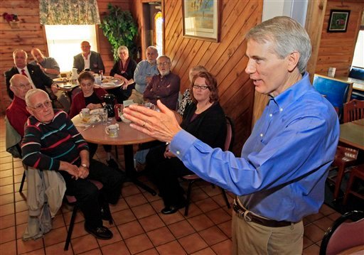 ISen. Rob Portman, R-Ohio, speaks to supporters at the Wayside Inn in West Union, Ohio, in May. Portman is often talked about as a potential vice president choice, but was absent from a bus tour through the state of Romney supporters this week. (AP Photo/Al Behrman)