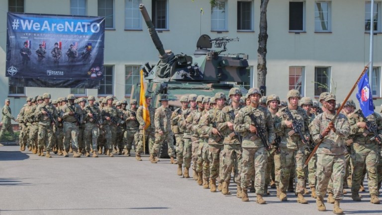 U.S. Army Soldiers assigned to the 2nd Cavalry Regiment march at a change of command ceremony in Bemowo Piskie Training Area, Poland after completing a six-month rotation, July 17, 2020.