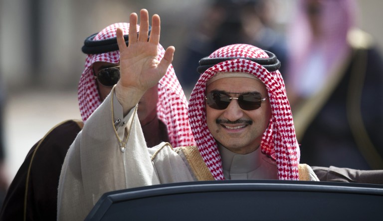 Three associates of Saudi Prince Alwaleed bin Talal (pictured above) say the billionaire investor has been released on Saturday after nearly three months in detention at a luxury hotel as part of an anti-corruption sweep. (AP Photo/Majdi Mohammed, File)