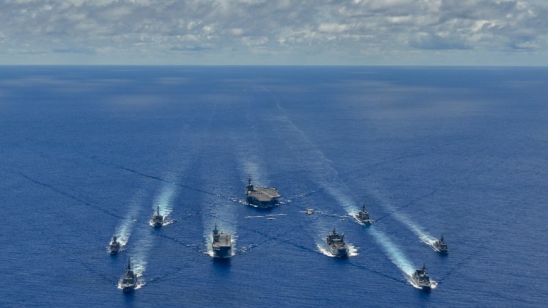 The Navyâs only forward-deployed aircraft carrier USS Ronald Reagan, the guided-missile cruiser USS Antietam JS Teruzuki and HMAS Stuart steam into formation during a trilateral exercise to support shared goals of peace and stability while enhancing regional security and the right of all nations to trade, communicate, and choose their destiny in a free and open Indo-Pacific region.
