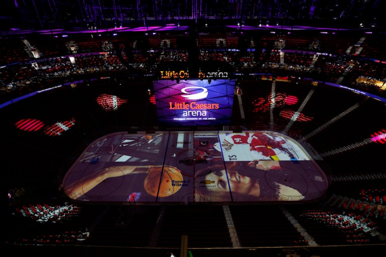 Lights and images are displayed on the ice inside of the Little Caesars Arena, home to the National Basketball Association's Detroit Pistons. 