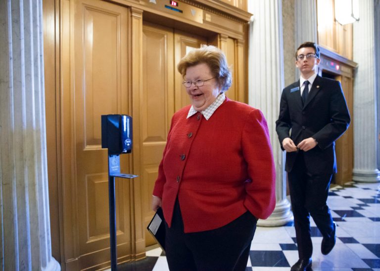 FILE - This March 24, 2014 file photo shows Senate Appropriations Committee Chair Sen. Barbara Mikulski, D-Md. walking on Capitol Hill in Washington. A bipartisan coalition on the Senate Appropriations Committee moved Thursday to roll back House GOP-backed cuts to Amtrak, transportation projects, and affordable housing projects, but pressures elsewhere in the budget may make the funding levels unsustainable as the massive $108 billion spending bill moves ahead. (AP Photo/J. Scott Applewhite, File)