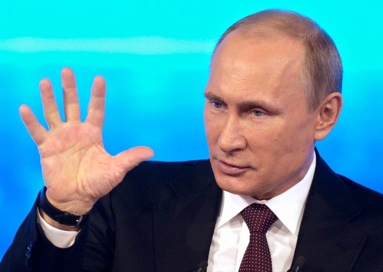 Russian President Vladimir Putin gestures as he speaks during a nationally televised question-and-answer session in Moscow on Thursday. Russia's President Vladimir Putin on Thursday dismissed claims that Russian special forces are fomenting unrest in eastern Ukraine as 