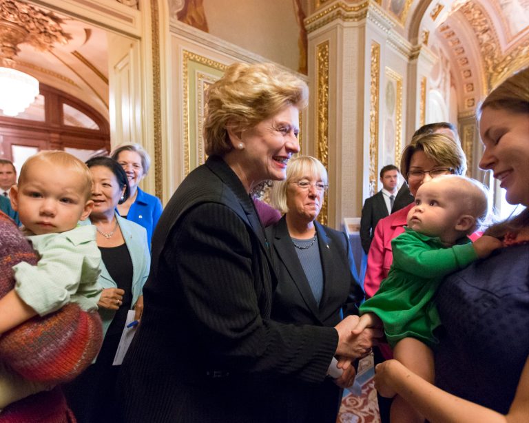 FILE - In this Sept. 25, 2013, file photo, Sen. Debbie Stabenow, D-Mich., center, and Sen. Patty Murray, D-Wash., center right, and other Democratic lawmakers joined new mothers and their babies at the Capitol to criticize Republican efforts to kill the Affordable Care Act, popularly known as 
