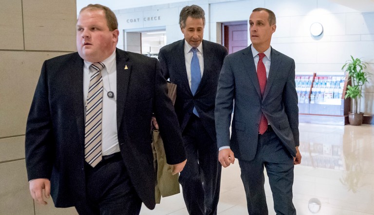 President Trump's former campaign manager Cory Lewandowski, right, and his lawyer Peter Chavkin, center, arrive to meet behind closed doors with the House Intelligence Committee, Thursday. (AP Photo/Andrew Harnik)