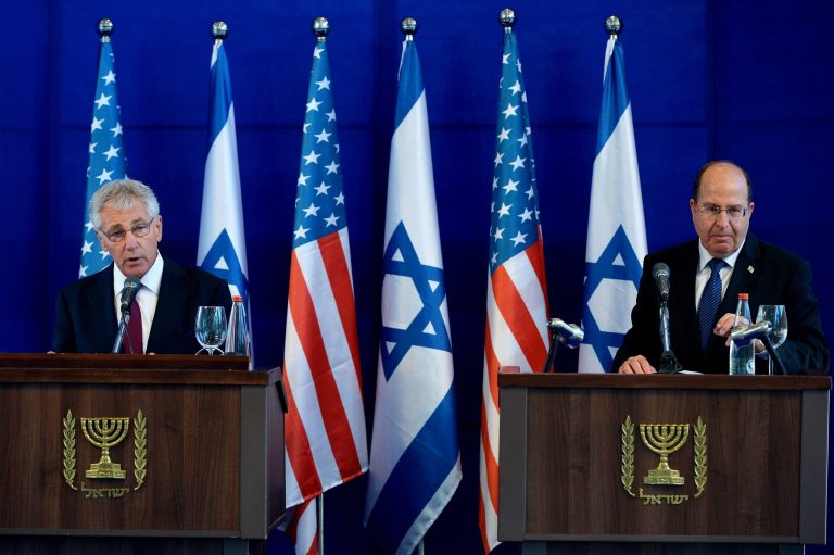 U.S. Defense Secretary Chuck Hagel, left, and Israel's Defense Minister Moshe Yaalon, right, speak during a joint conference following a meeting at Israel's Defense Force headquarters in Tel Aviv, Thursday, May 15, 2014. Hagel is on a regional tour focusing on Iran's nuclear program and Syria's civil war. (AP Photo/Mandel Ngan, Pool)
