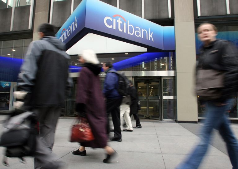 Pedestrians walk past a Citibank branch on Park Avenue in New York, in this Nov. 21, 2008 file photo. (AP Photo/Jin Lee, file)