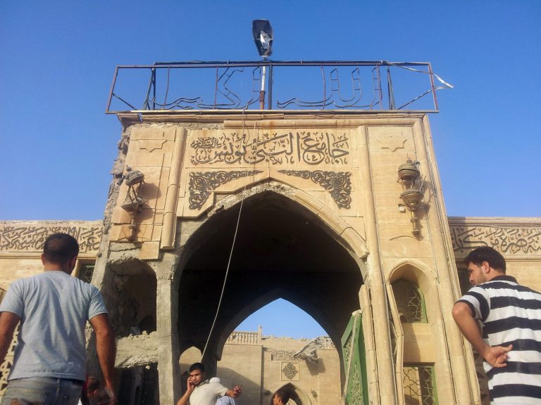 People inspect the destroyed Mosque of The Prophet Younis, or Jonah in Mosul, 225 miles (360 kilometers) northwest of Baghdad, Iraq, Thursday, July 24, 2014. The revered Muslim shrine was destroyed on Thursday by militants who overran the city in June and imposed their harsh interpretation of Islamic law. The mosque was built on an archaeological site dating back to 8th century BC, and is said to be the burial place of the prophet, who in stories from both the Bible and Quran is swallowed by a whale. (AP Photo)