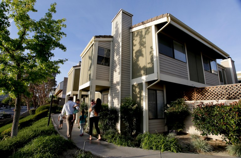 Policymakers need to consider how government policies are driving up the costs of housing and higher education. (AP Photo/Chris Carlson)
