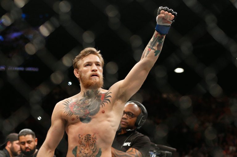 UFC featherweight champion Conor McGregor laughed off Donald Trump's one-sided feud with Ronda Rousey. "It means nothing so, Donald can shut his big fat mouth," McGregor to TMZ. (AP Photo/John Locher)