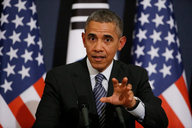 U.S. President Barack Obama answers a reporter's question during a joint news conference with South Korean President Park Geun-hye at the Blue House in Seoul, South Korea, Friday, April 25, 2014. Obama says Japan's use of South Korean 