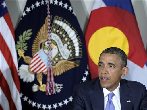 President Obama participates in a meeting at the Denver Police Academy with local law enforcement officials and community leaders to discuss the state's new measures to reduce gun violence. (AP Photo/Susan Walsh)