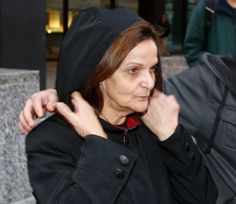 FILE -- In this Oct. 22, 2013 file photo, Rasmieh Yousef Odeh departs the federal courthouse after her initial appearance before U.S. Magistrate Judge Michael Mason in Chicago. Odeh, 66,  is due to make her first appearance Wednesday, Nov. 13, 2013 before a federal judge in Detroit on charges she allegedly lied about her conviction for a deadly bombing more than 40 years ago in Israel. (AP Photo/Charles Rex Arbogast, File)