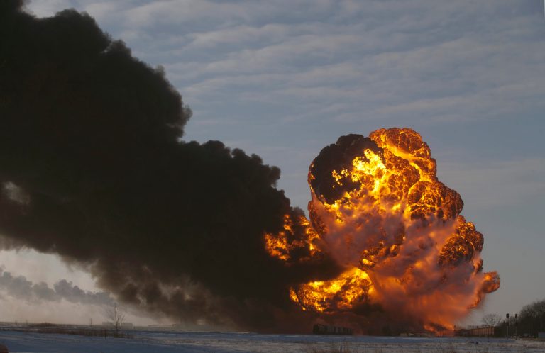 In this Dec. 30, 2013 file photo, a fireball goes up at the site of an oil train derailment in Casselton, N.D. Members of North Dakota's congressional delegation say they plan to press federal officials for more information about the tanker derailment and fiery explosion outside of Casselton. (AP Photo/Bruce Crummy, File)