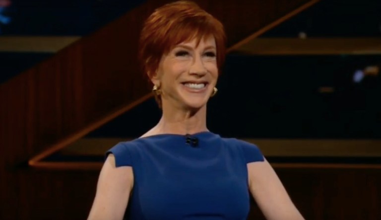 On Friday, comedienne Kathy Griffin announced her first shows in the U.S. since she caused a controversy last year after a photo of her holding a bloody head resembling President Trump went viral. (screenshot via HBO)