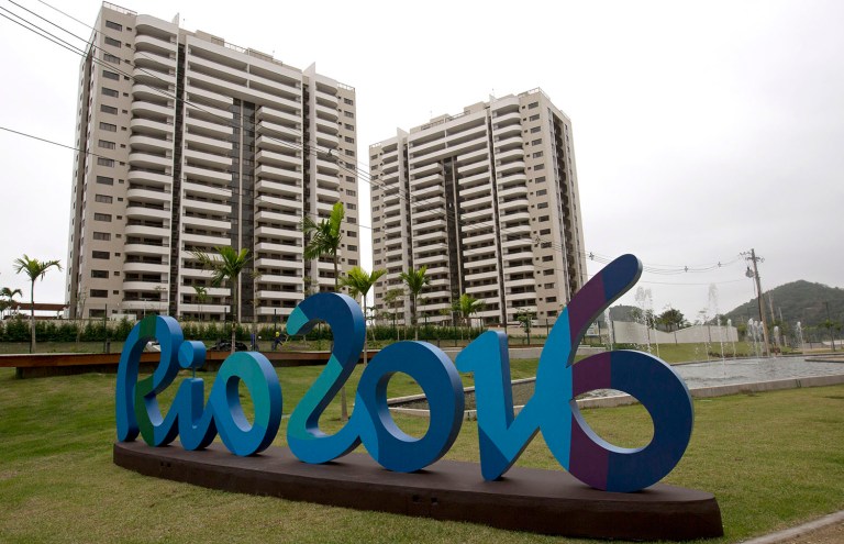 Between 350,000 and 500,000 visitors and athletes from 207 countries are expected to attend the games. (AP Photo/Silvia Izquierdo)