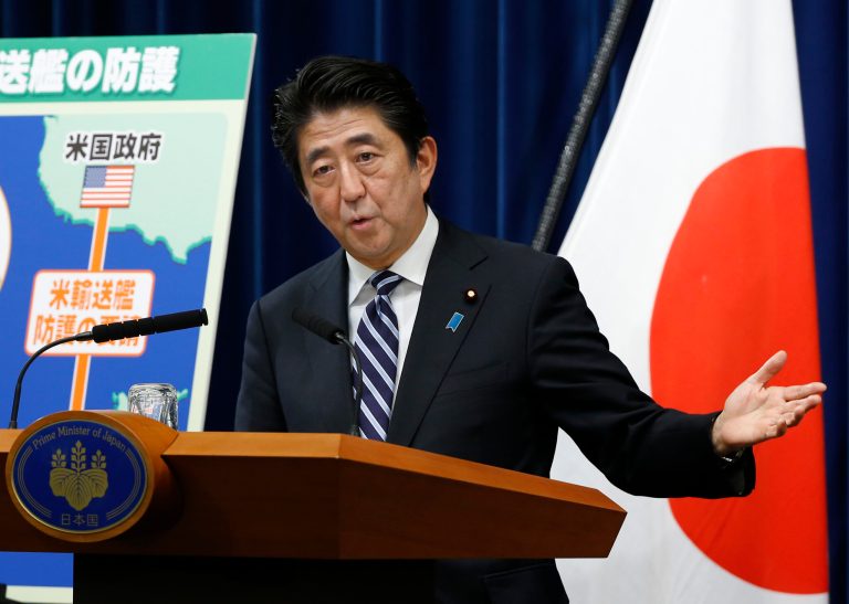 Japan's Prime Minister Shinzo Abe speaks during a press conference at the prime minister's official residence in Tokyo, Thursday, May 15, 2014. Citing threats from China and North Korea, a government-appointed panel is urging Japan to reinterpret its pacifist constitution to allow the use of military force to defend other countries. The recommendation, submitted Thursday to Prime Minister Abe, sets the stage for his push to allow the military to play a greater role in international security.  (AP Photo/Shizuo Kambayashi)