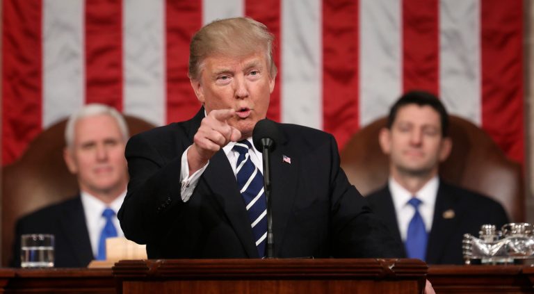 FILE - In this Feb. 28, 2017, file photo, President Donald Trump addresses a joint session of Congress on Capitol Hill in Washington. as Vice President Mike Pence and House Speaker Paul Ryan of Wis. listen. Trump will deliver his first State of the Union address on Tuesday, Jan. 30, 2018. (Jim Lo Scalzo/Pool Image via AP, File)