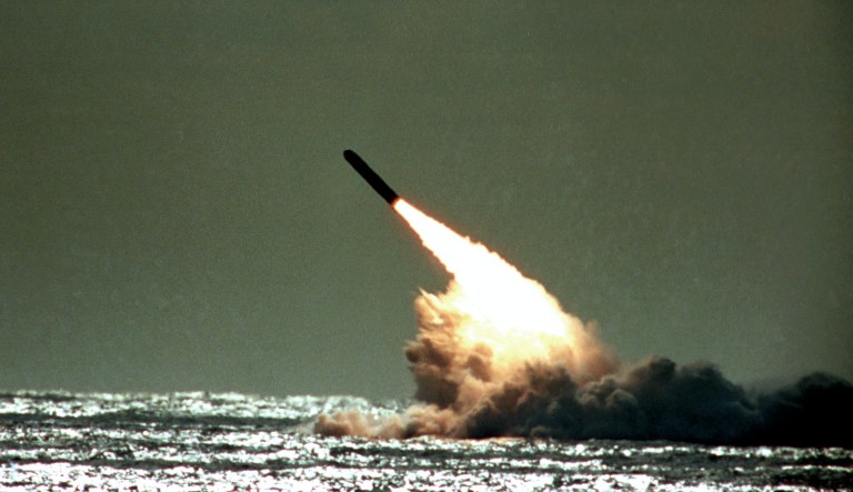 FILE - The Dec. 4, 1989 file photo shows U.S. Navy launching a Trident II, D-5 missile from the submerged submarine USS Tennessee in the Atlantic Ocean off the coast of Florida. 