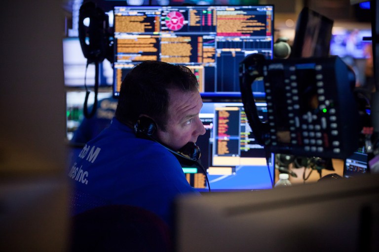 A trader works on the floor of the New York Stock Exchange (NYSE) in New York, U.S., on Monday, Sept. 17, 2018. U.S. stocks started the week lower, while Asian equities slumped and European shares were little changed, as investors grappled with the latest American threats to expand tariffs on Chinese goods. 