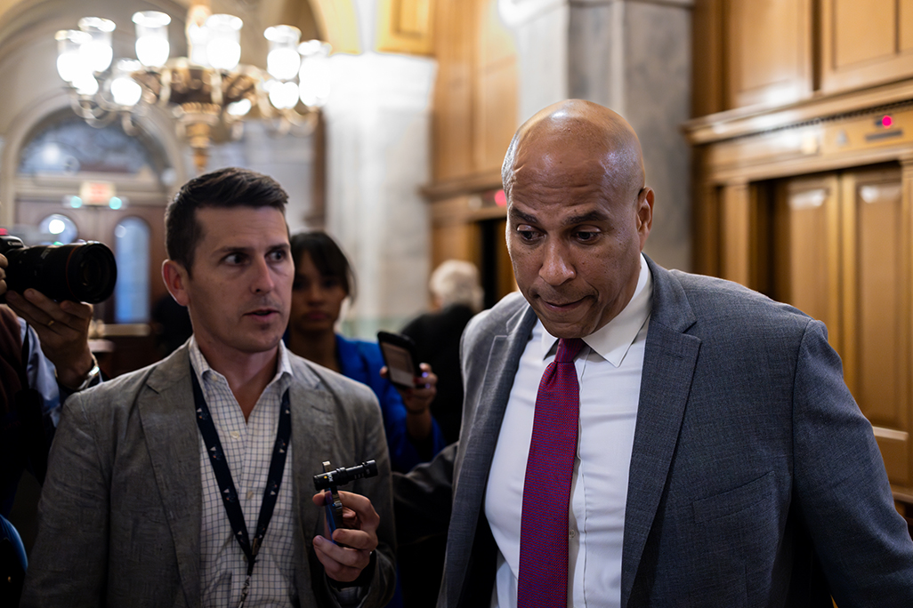 Sen. Cory Booker (D-NJ) takes questions from reporters on Capitol Hill on Sept. 26, 2023. Booker called for fellow Sen. Bob Menendez (D-NJ) to resign on Tuesday, joining a growing list of Democrats who have called for the politician to step down in light of recent federal bribery charges.