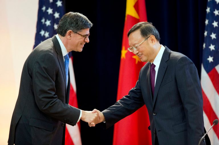 U.S. Treasury Secretary Jack Lew, left, shakes hands with China's State Councilor Yang Jiechi, right, at the 7th U.S.-China Strategic and Economic Dialogue at the State Department in Washington, Tuesday, June 23, 2015. (AP Photo)Â 