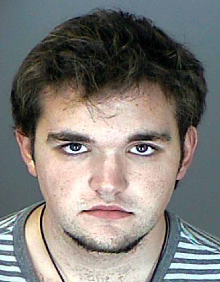   FILE - This undated booking photo released by the Westminster, Colo., Police Department shows Austin Reed Sigg. A motions hearing is scheduled Wednesday Dec. 12, 2012, for Sigg, who is charged with murder and other crimes in the abduction and slaying of 10-year-old Jessica Ridgeway. (AP Photo/Westminster Police Department, file)  