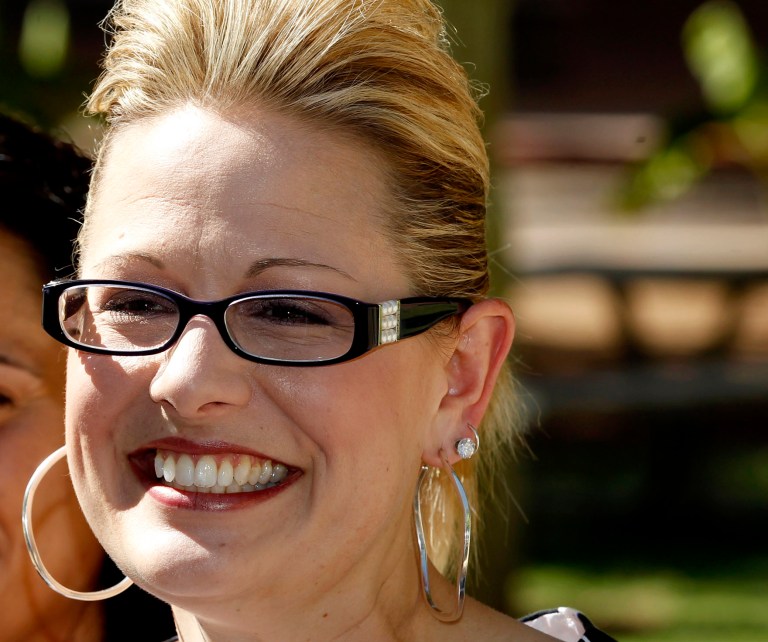 Kyrsten Sinema has four college degrees and has taught at Arizona State University, the school she now represents, for the past 11 years. (AP/Ross D. Franklin)