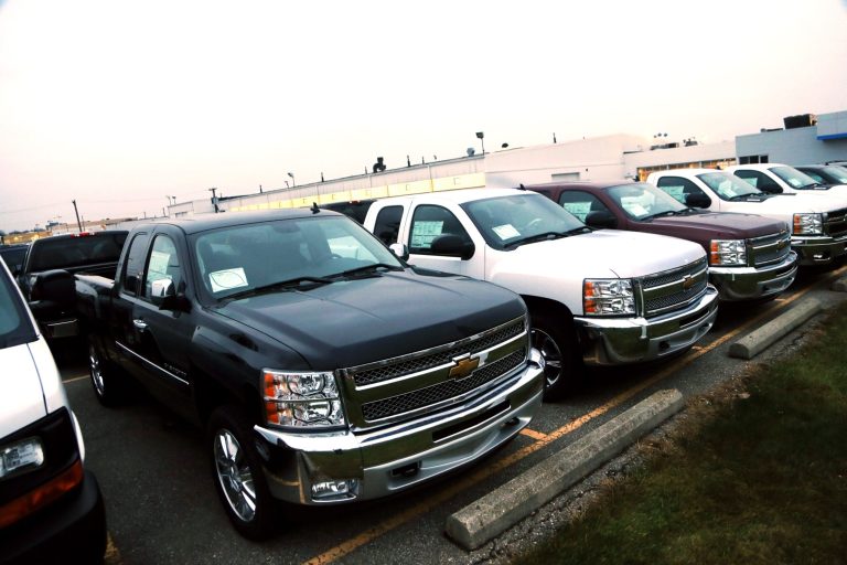  Chevrolet Silverado pickup trucks are seen on a dealer's lot in Troy, Mich., Monday, Dec. 17, 2012. General Motors is offering generous deals to clear a growing inventory of Chevy and GMC pickup trucks. ItÃ­s matching or beating deals offered by Ford and Chrysler. That, plus low interest rates, sweet lease deals and abundant financing, is good news for truck buyers. (AP Photo/Carlos Osorio)  