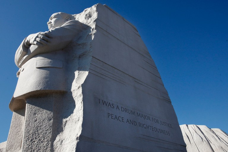   FILE - This Jan. 15, 2012 file photo shows the Martin Luther King, Jr. Memorial in Washington, with the quote carved on the side of new memorial in Washington that will be changed. Interior Secretary Ken Salazar endorsed a plan Tuesday to remove a disputed inscription from the Martin Luther King Jr. Memorial, rather than cut into the granite to replace it with a fuller quotation. Salazar said he had reached an agreement with Kingâs family, the group that built the memorial and the National Park Service to remove a paraphrase from Kingâs âDrum Majorâ speech by carving grooves over the lettering to match existing scratch marks in the sculpture. Memorial sculptor Lei Yixin recommended removing the inscription this way to avoid harming the monumentâs structural integrity. (AP Photo/Jacquelyn Martin, File)  