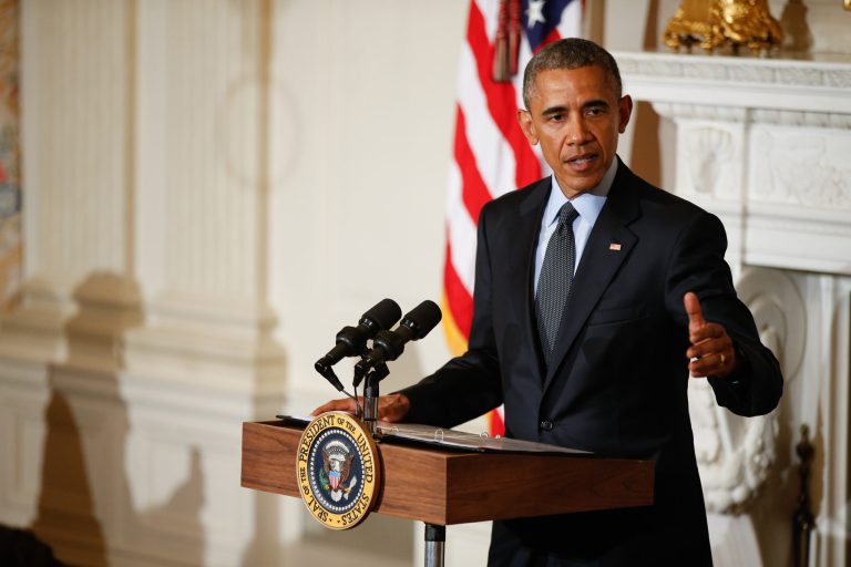President Barack Obama speaks before introducing poet laureate Elizabeth Alexander for a poetry reading, Friday, April 17, 2015, in the State Dining Room of the White House in Washington. (AP Photo/Andrew Harnik)