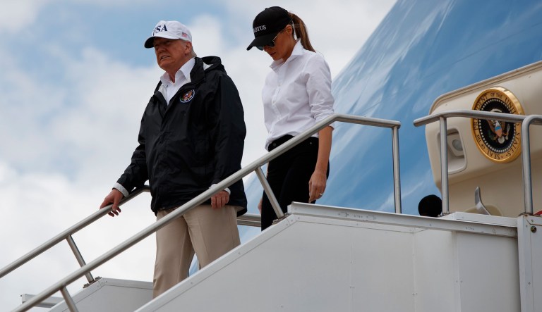 President Donald Trump and first lady Melania Trump arrive on Air Force One at Austin-Bergstrom International Airport in Austin, Texas, Tuesday, Aug. 29, 2017, for briefings on Harvey relief efforts. (AP Photo/Evan Vucci)