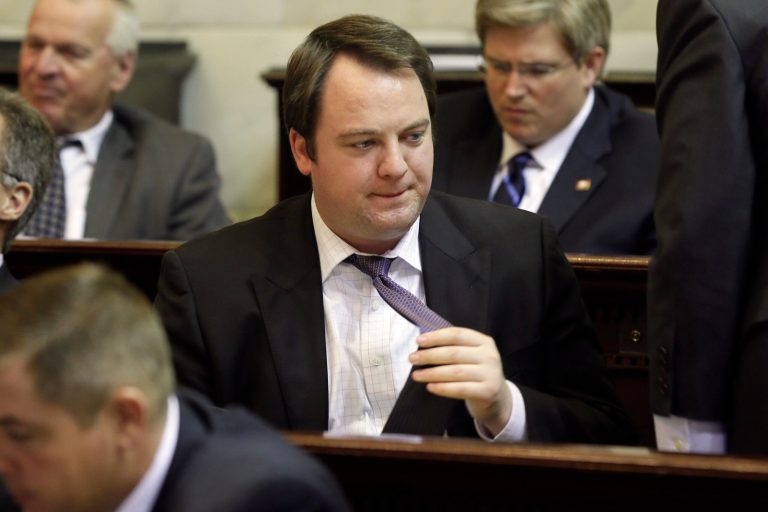 Rep. John Burris, R-Harrison, listens to proceedings in the House chamber at the Arkansas state Capitol in Little Rock, Ark., Thursday, Feb. 13, 2014. Earlier Thursday the Joint Budget Committee advanced a funding bill supported by Burris for the state's compromise Medicaid expansion. (AP Photo/Danny Johnston)