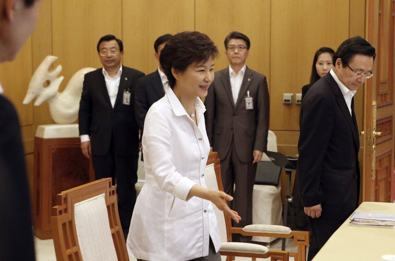 South Korean President Park Geun-hye, center, arrives to preside over a security meeting to discuss the upcoming South and North Korea talks at the presidential house in Seoul, South Korea, Monday, June 10, 2013. The two Koreas will hold their highest-level talks in years Wednesday in an effort to restore scrapped joint economic projects and ease animosity marked by recent threats of nuclear war. That is in itself progress, though there are already hints that disputes in their bloody history could thwart efforts to better ties. (AP Photo/Yonhap, Do Kwang-hwan) KOREA OUT