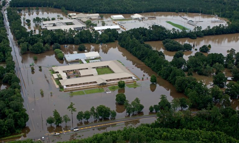 Donald Trump and Mike Pence are expected to view some of the flood-damaged areas in Louisiana around midday Friday, though no details have been released. (AP Photo)
