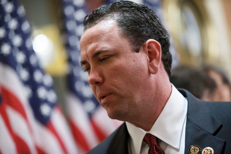 This photo taken Nov. 21, 2013 shows then-newly-elected Rep. Vance McAllister, R-La. waiting to be sworn in on Capitol Hill in Washington. McAllister says he's asking his family and constituents for forgiveness after a West Monroe newspaper published a video that it says shows the congressman kissing a female staffer in his congressional office in Monroe, La. McAllister, only in office a little over four months, attracted national attention because of his endorsement from the bearded men of the 